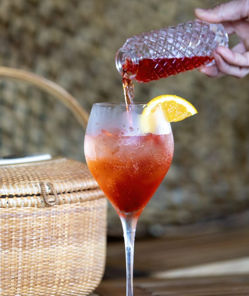 A bartender makes a cocktail